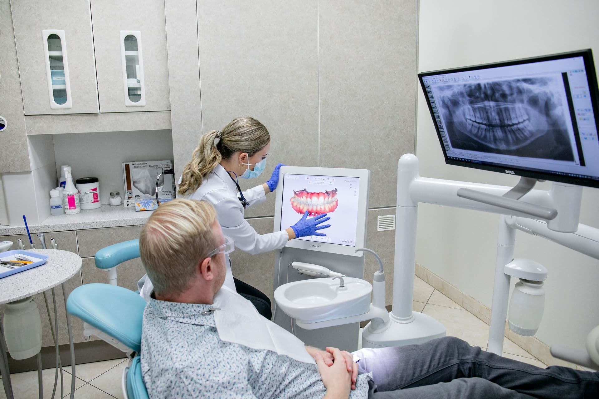 Dr. Tina Ramirez reviewing a 3D digital scan with a patient